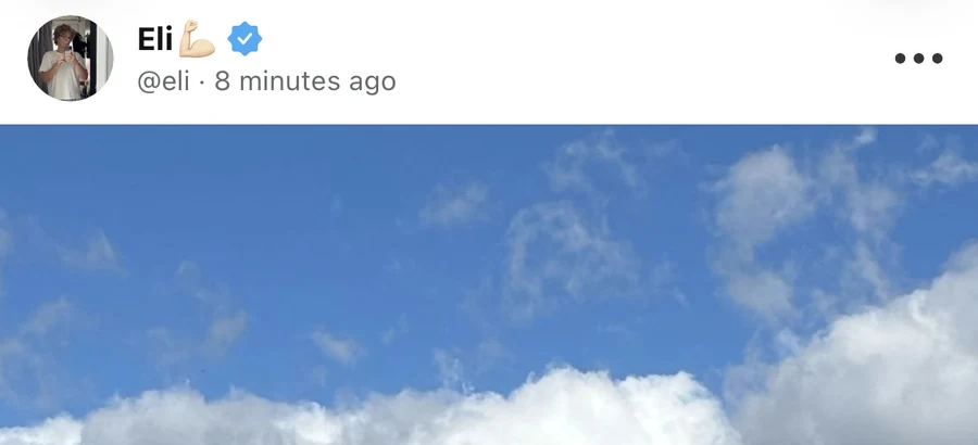 Photo post with its author details and a three-dot menu button in the top-right corner.