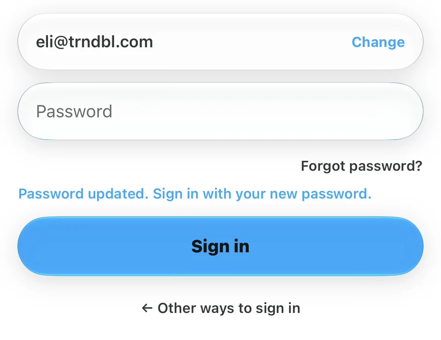 Sign-in screen showing Password updated. Sign in with your new password. above the Sign in button.